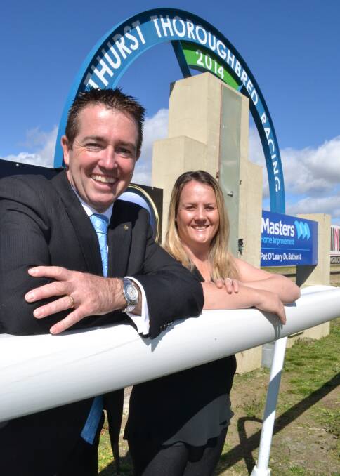 BIG BUCKS: Bathurst MP Paul Toole and Ali Webster from Bathurst Thoroughbred Racing at Friday's announcement that Bathurst will host a final of the Central District Region Country Championships Final on March 16 next year.                          082814turf2
