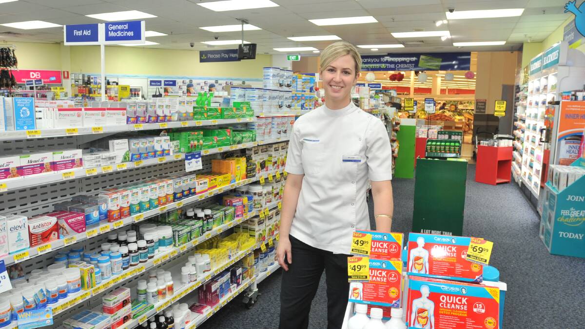 CASH FOR SCHOOLS: Blooms the Chemist pharmacist and owner Melanie Moses is one of the business owners participating in the Central Square shopping centre Cash for Schools campaign. Photo: JUDE KEOGH         0410orgcentral1