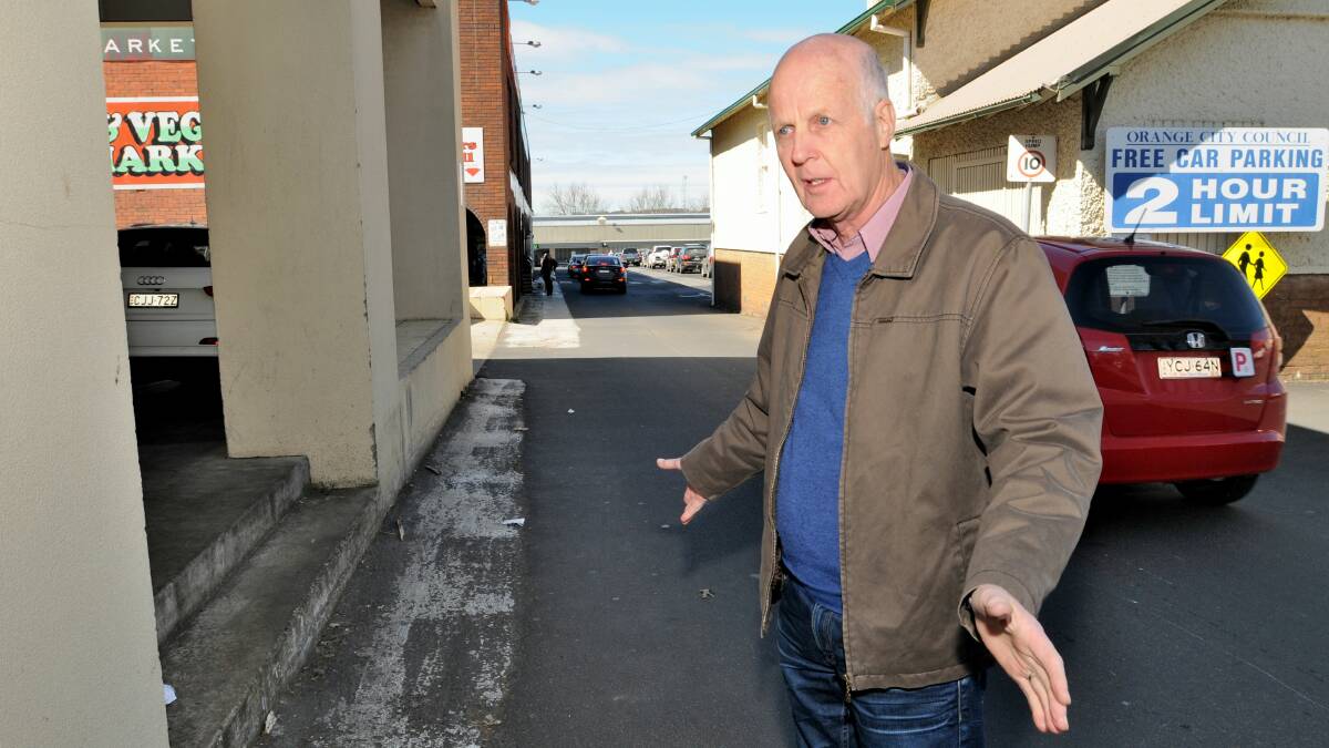 SAFETY FIRST: Orange councillor Neil Jones has supported an upgrade and expansion of Harris Farm Markets but says the council also needs to do its bit and upgrade pedestrian access leading from Sale Street to the store. Photo: STEVE GOSCH 0902sgpedestrian1
