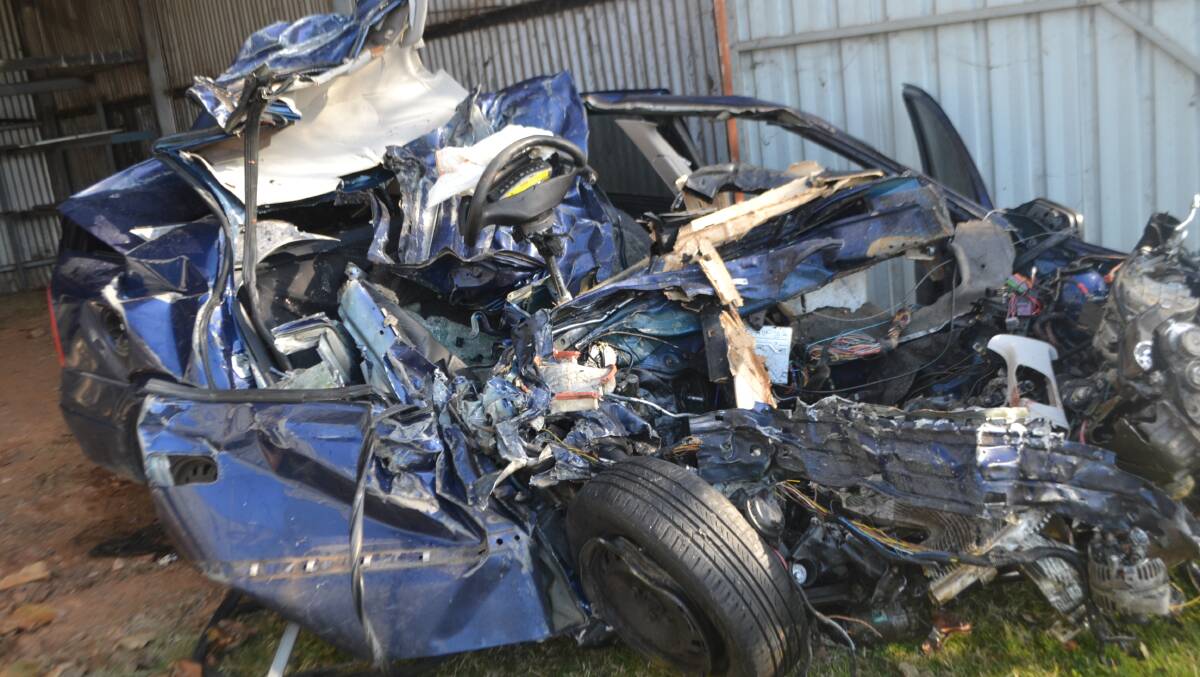 UNRECOGNISABLE: A 19-year-old man died instantly when his car collided head-on with a truck on the Mitchell Highway west of Wellington.