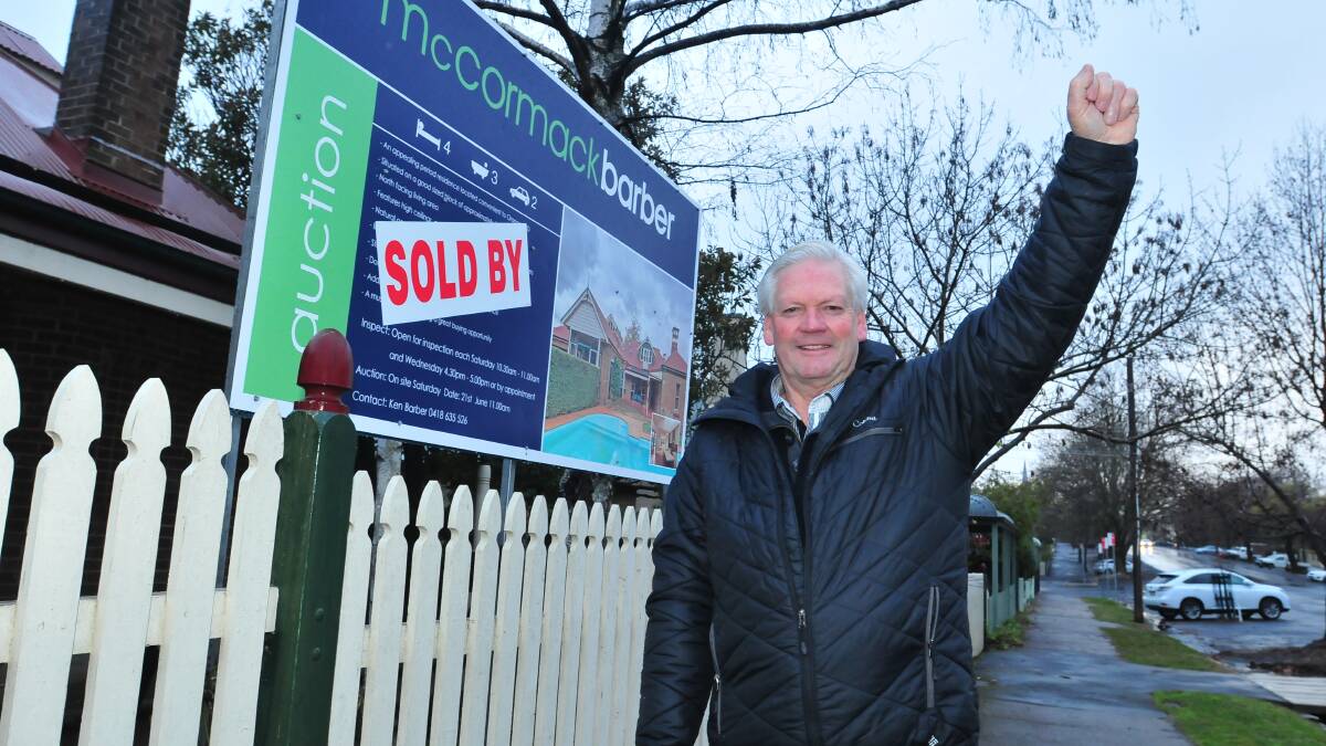 HOUSE PARTY: McCormack Barber principal Ken Barber says Champagne corks popped after the record-breaking sale of a Byng Street property on Saturday.
Photo: JUDE KEOGH 0624sold2