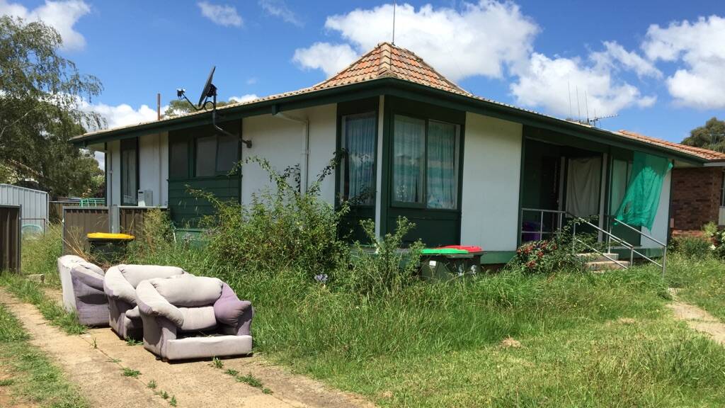 BAD LOOK: A public housing property in Currong Crescent has been left in a state of disrepair since last year.   Photo: SUPPLIED
