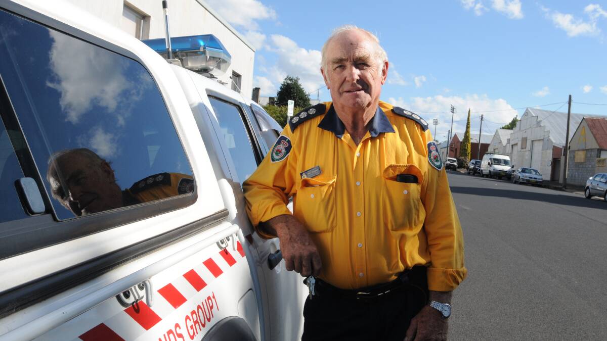 FIRE IN HIS VEINS: John Sturgeon will be awarded the Australian Fire Service Medal for his 50 years of service to the Rural Fire Service.
Photo: JUDE KEOGH 0205rfsmedal2