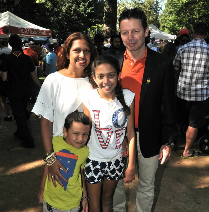 FAMILY SUPPORT: Orange Australia Day ambassador David Bitton was supported by his wife Sohani Bitton, daughter Monet and son Mayen at the Australia Day ceremony in Cook Park on Monday. Photo: STEVE GOSCH                          0126sgaust42