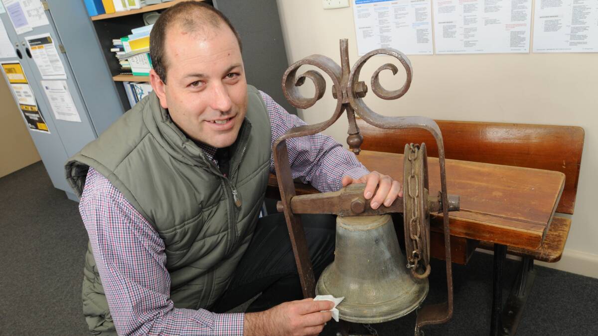 HISTORICAL CELEBRATION: Orange East Public School principal Glen Bourke said an old school bell, found under a school building, will be polished and reinstalled for the school’s 125th anniversary on November 13 and 14. Photo: STEVE GOSCH               0903sgorangeeast2