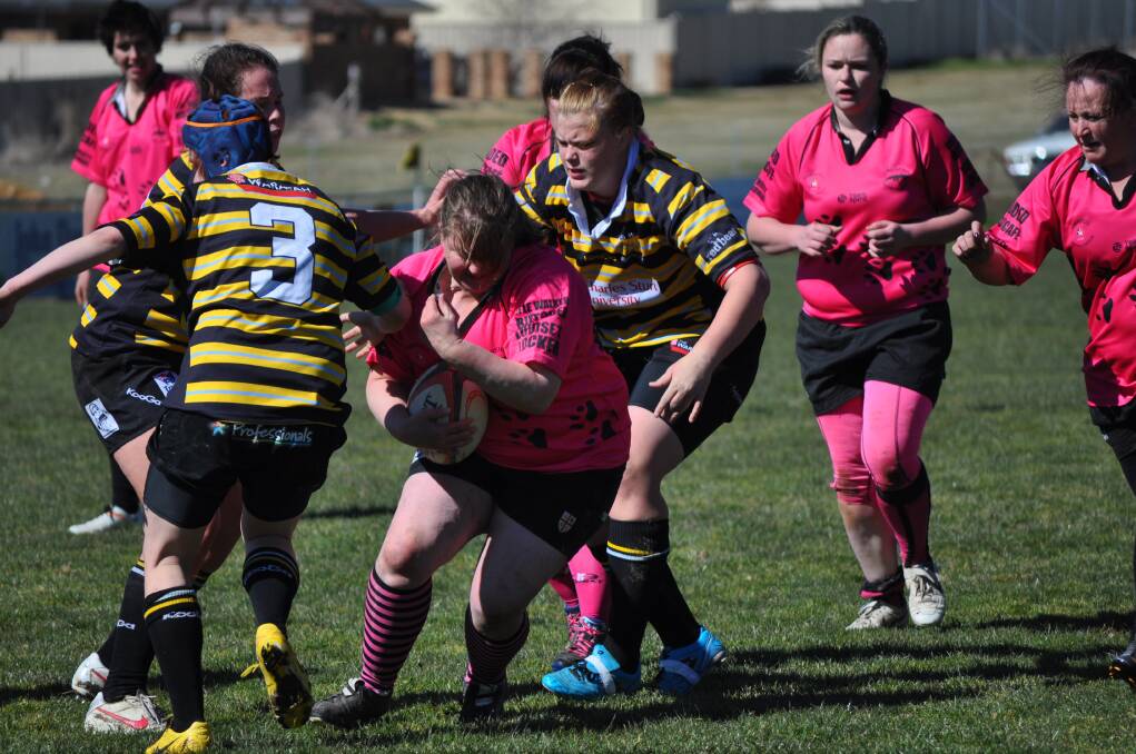 BACK FOR THE WIN: Charmaine Buckley, pictured scoring one of two tries in the 2012 final for Grenfell, will be a welcome addition to the Central West team in Orange today. Photo: NICK MCGRATH 				                         0901nmgirls2