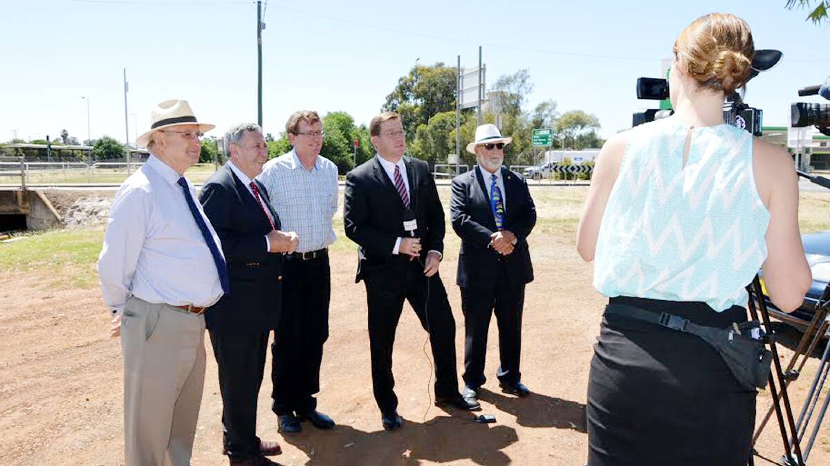 REGIONAL INVESTMENT: Forbes mayor Ron Penny, Roads Minister Duncan Gay, Member for Orange Andrew Gee, deputy premier Troy Grant and Parkes mayor Ken Keith have announced a multi-billion-dollar regional infrastructure plan. 					              1126suppoleswires1
