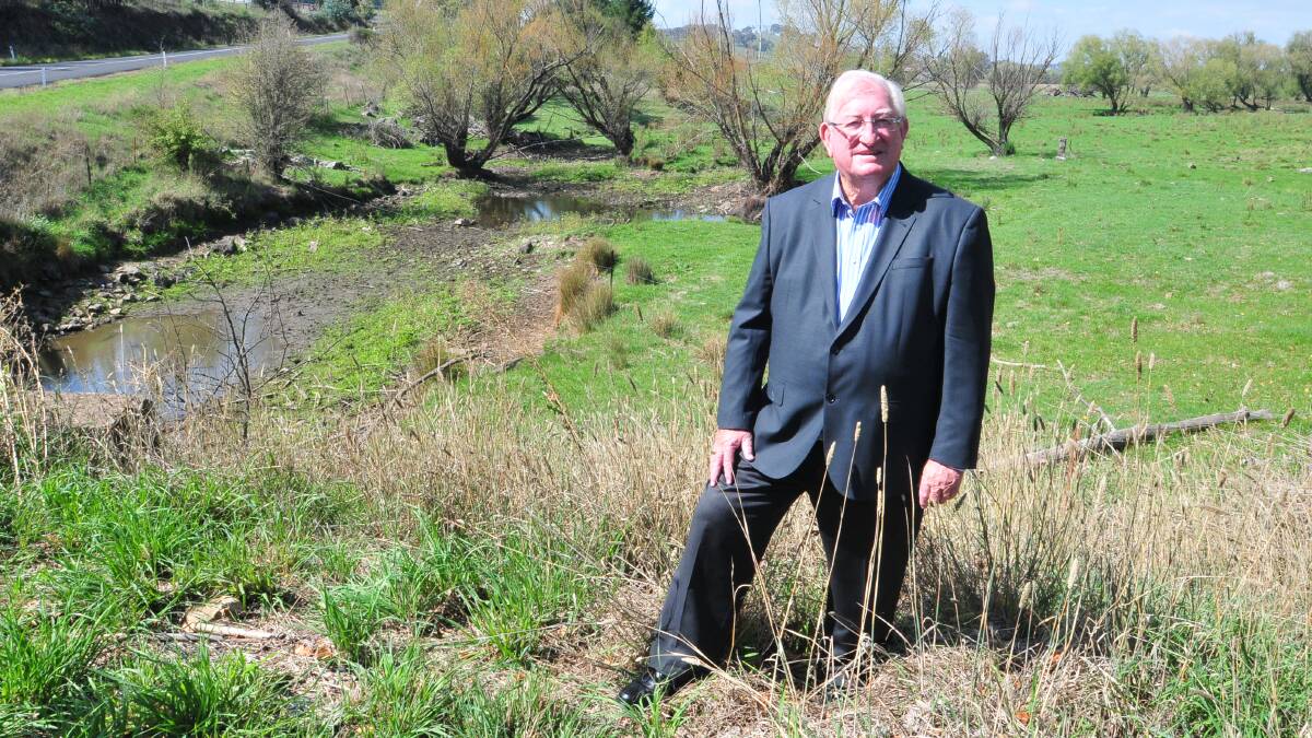 DAM SHAME: Orange mayor councillor John Davis is surprised recent rain has failed to trickle down to Suma Park Dam’s main supply source Summer Hill Creek. Photo: JUDE KEOGH  0306pipeline3