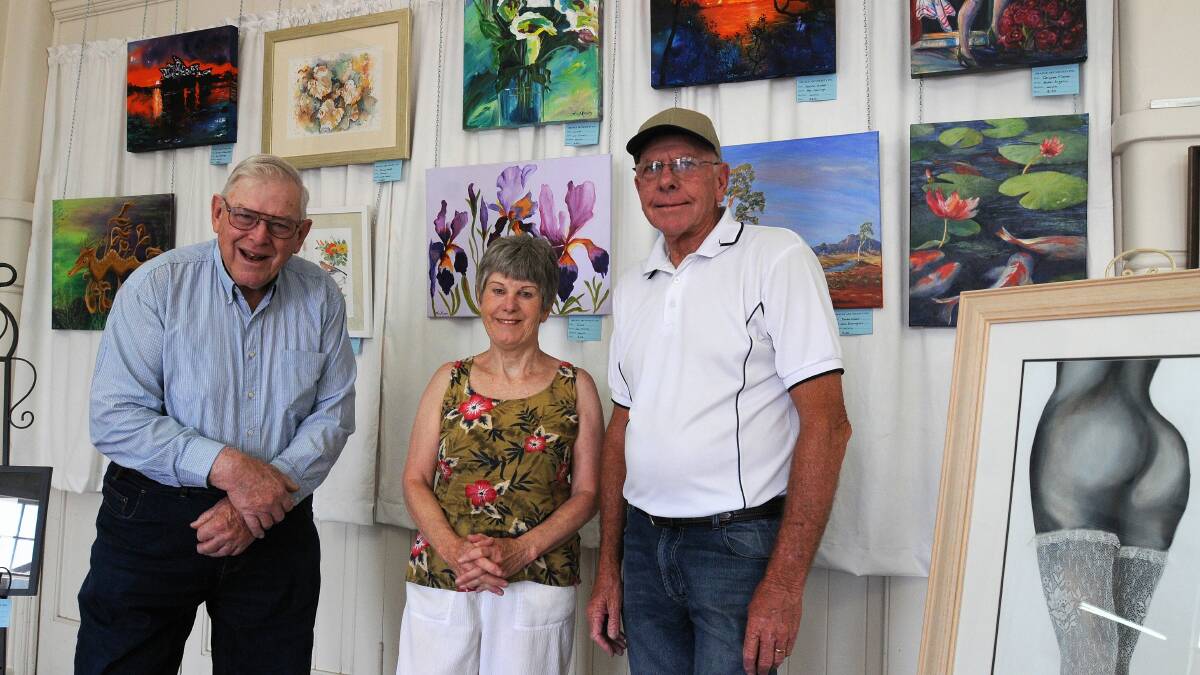 CALLING ALL ARTISTS: Neil Skinner, Lynne Edwards and Tony Kennedy at Orange Cultural Centre. Photo: Steve Gosch 1202sgart6