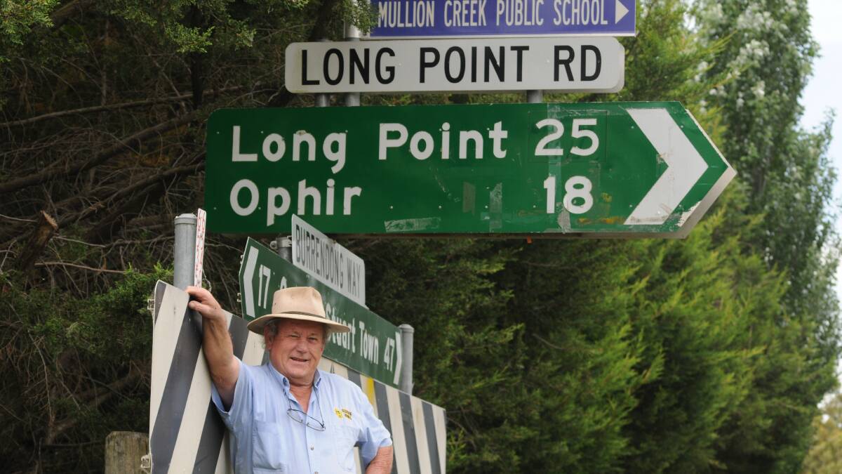 ROAD TO SOMEWHERE: Former councillor Martin Gleeson hopes this turnoff from the Burrendong Way will soon allow motorists to access Mudgee reliably. Photo: STEVE GOSCH                  1126sglongpoint1

