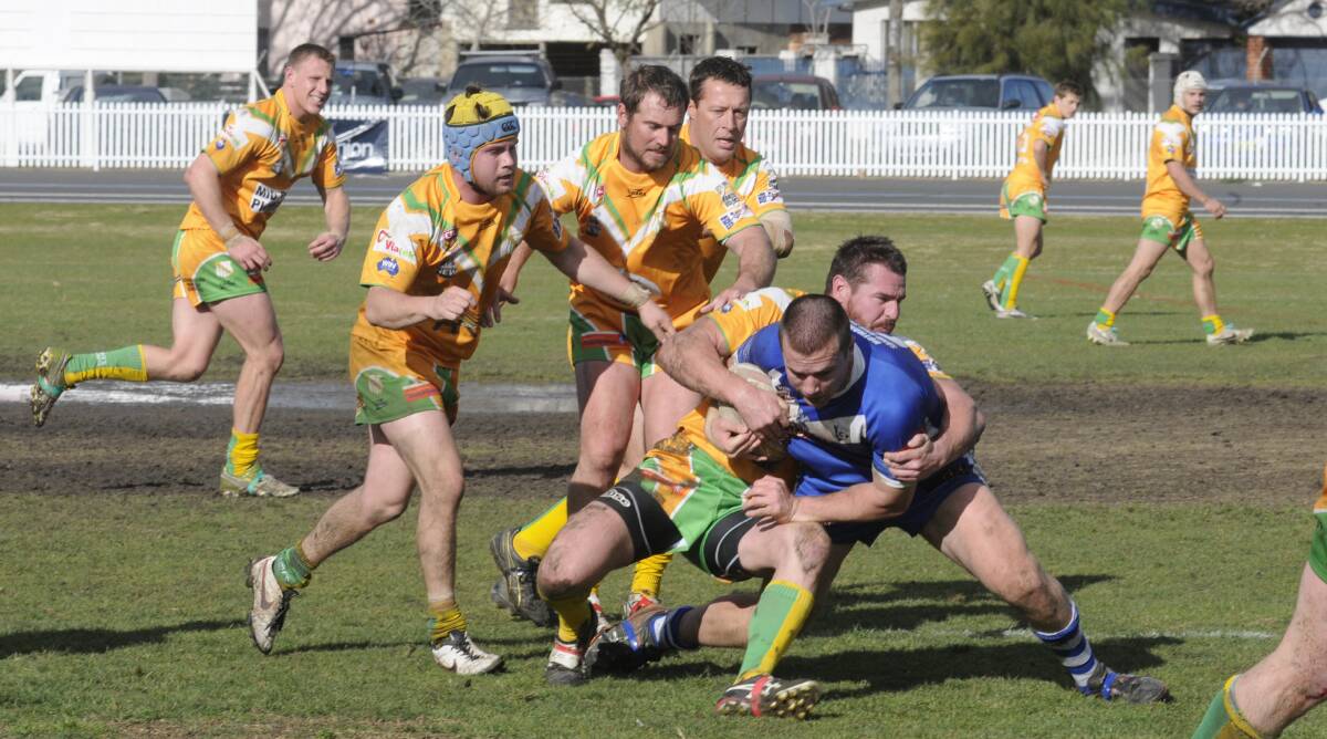 WRESTLE: CYMS' big man Brent Colley brings down St Pat's front rower Luke Single in yesterday's 32-10 loss. Photo: CHRIS SEABROOK	          081714cpats2