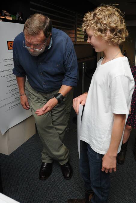 TRADE SECRET: Jack Thompson showed acting hopeful Noah Lamrock how to break a leg and take a bow after his poetry performance yesterday. Photo: STEVE GOSCH                0216sgjack
