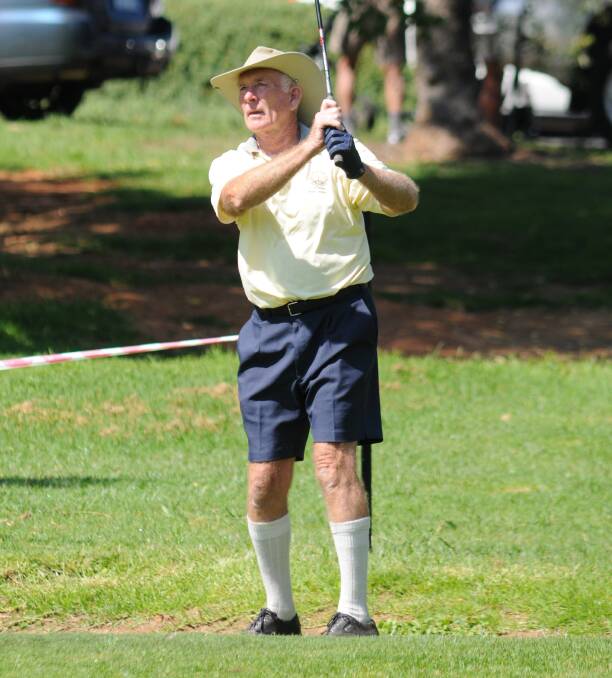 ON HIS GAME: Keith Stephens of Mollymook watches his shot on the 14th hole at Wentworth. Photo: STEVE GOSCH 0313sggolf2
