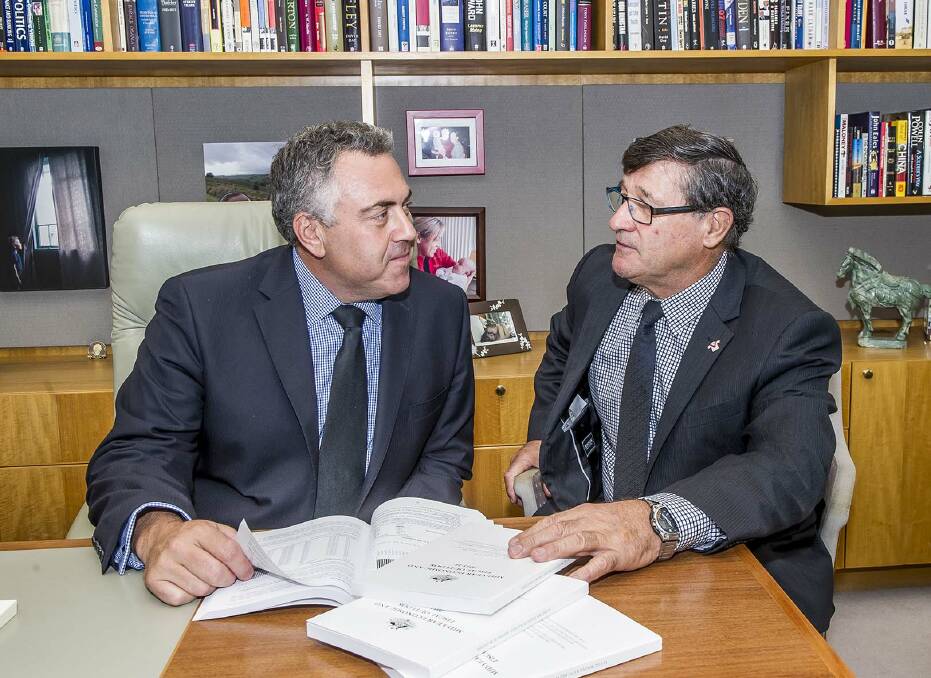 TALL ORDER: Federal treasurer Joe Hockey goes over the tough budget with member for Calare John Cobb. Mr Cobb says the budget will ensure his grandchildren have a sustainable future.
