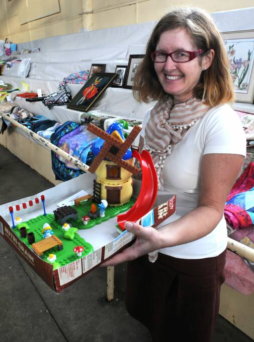 OUT OF THE BOX: Lis Arundell brought in her daughters’ entries yesterday in the Lego competition to be judged at the 2014 Orange Show. Photo: STEVE GOSCH0507show
