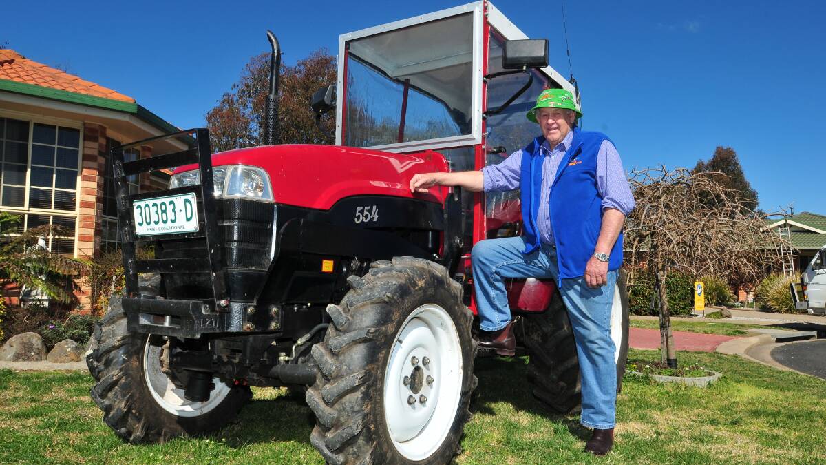 TRACTOR FUN: Wal Harris will be on of 100 people participating in Camp Quality’s Tractor Trek which begins on Thursday morning. Photo: JUDE KEOGH					  0912tractor4
