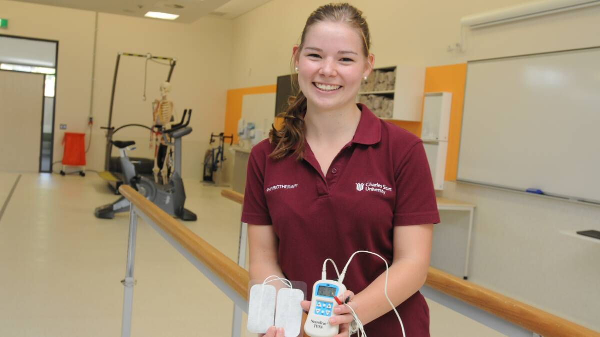 HELP FOR DIABETICS: Charles Sturt University physiology honours student Gabrielle Upton needs 16 people with diabetes to participate in her study. Photo: JUDE KEOGH 0115physio1
