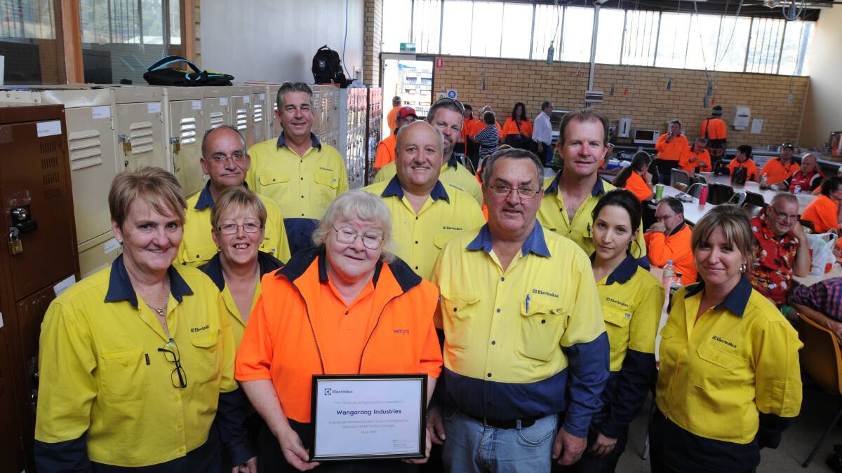 END OF AN ERA: Stock control staff from Electrolux were thanked at a barbecue at Wangarang on Tuesday. Pictured are (back) Garry Colley, Wayne Campbell, (middle) John Brakenridge, Steve Brakenridge, Daryl Roweth, (front) Janet McLean, Debra Leonard, Marie Robinson (who has worked at Wangarang for 47 years), Bill Kelly, Isabel Garces and Reniece Wright. Photo: STEVE GOSCH 				                        0405sgwangarangnews
