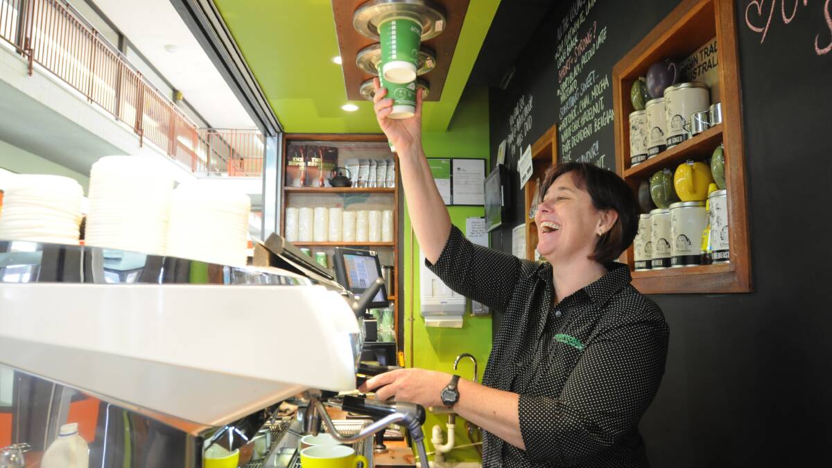 IN IT FOR THE LONG HAUL: Scrumptious On Summer cafe owner Suzy Glasby says she must constantly reinvent the cafe in order to stay on top of the competition.
Photo: STEVE GOSCH 0811sgcoffee
