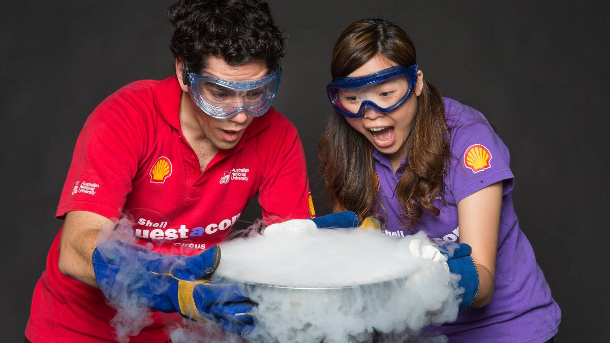COOL SCIENCE: Presenters Tom Carruthers and Jirana Boontanjai holding liquid nitrogen at the science circus, which will be at the function centre on Wednesday. Photo: SUPPLIED
