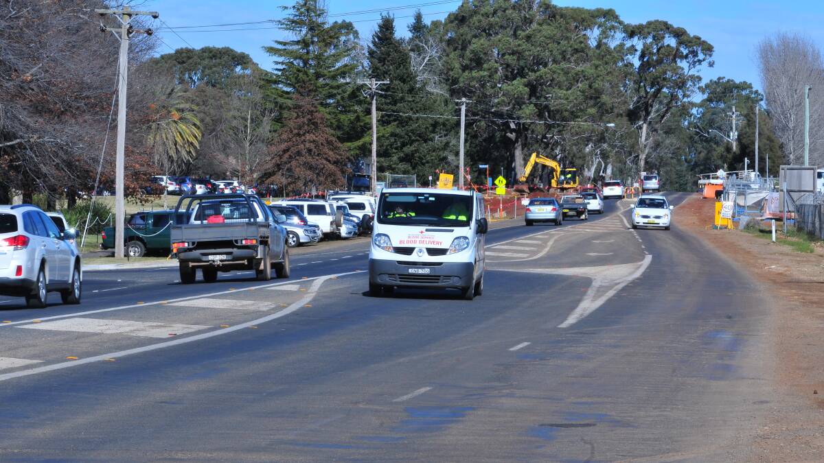 TRAFFIC TRIO: A four-lane intersection outside Orange Health Service will be home to one of three sets of traffic lights on Forest Road. Photo: JUDE KEOGH 	     0709hospintersect