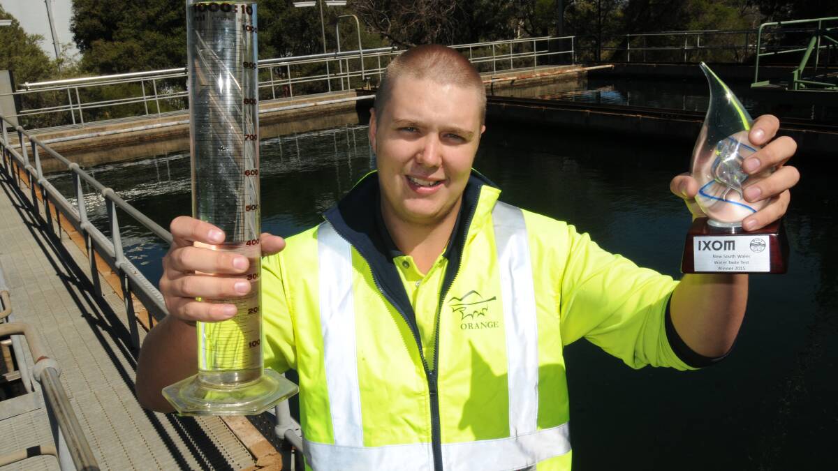 HIGH QUALITY DROP: Icely Road Water Treatment Plant assistant water treatment operator Jake Livermore is excited about winning the 2015 Water Industry Operators Association NSW Exhibition and Conference water taste test title. Photo: STEVE GOSCH 0327sgwater1