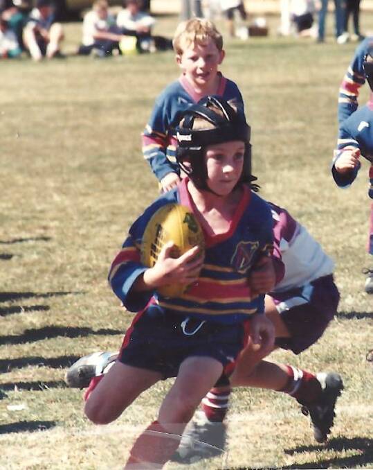 BACK IN THE DAY: James Maloney, pictured playing for SJS in the under-8s, will get another crack at Origin.