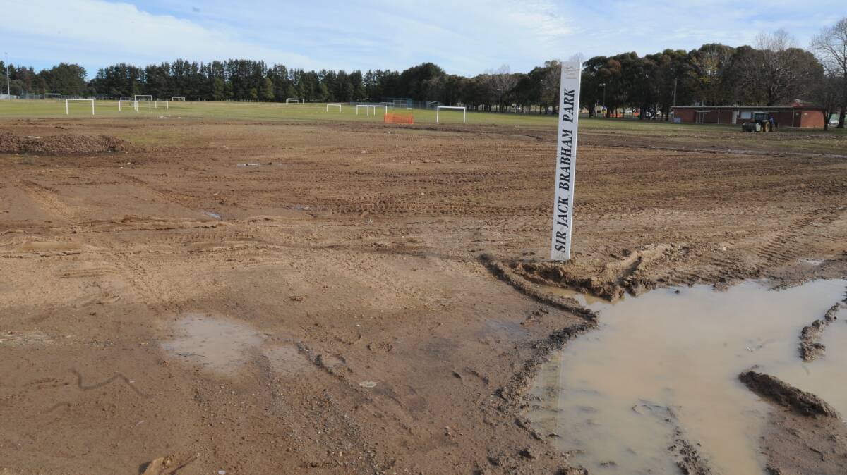 CLEAN UP JOB: Orange City Council staff are working to repair Sir Jack Brabham Park after a water pipe burst there last month. Photo: STEVE GOSCH 							   0714sgbrabham1