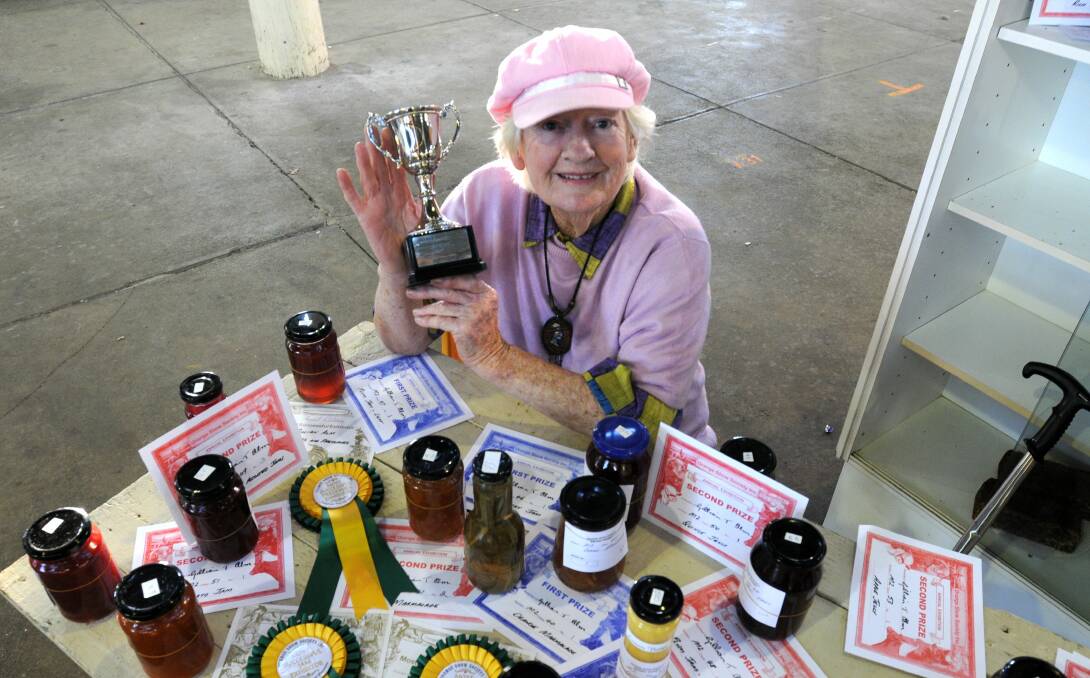WHAT A CHAMPION : Gillian Alm, 81, drove all the way from Sydney to put her entries into the Orange Show. To make the trip worthwhile, she won several prizes and was awarded the perpetual trophy. Photo: STEVE GOSCH                                                            0511gillian3