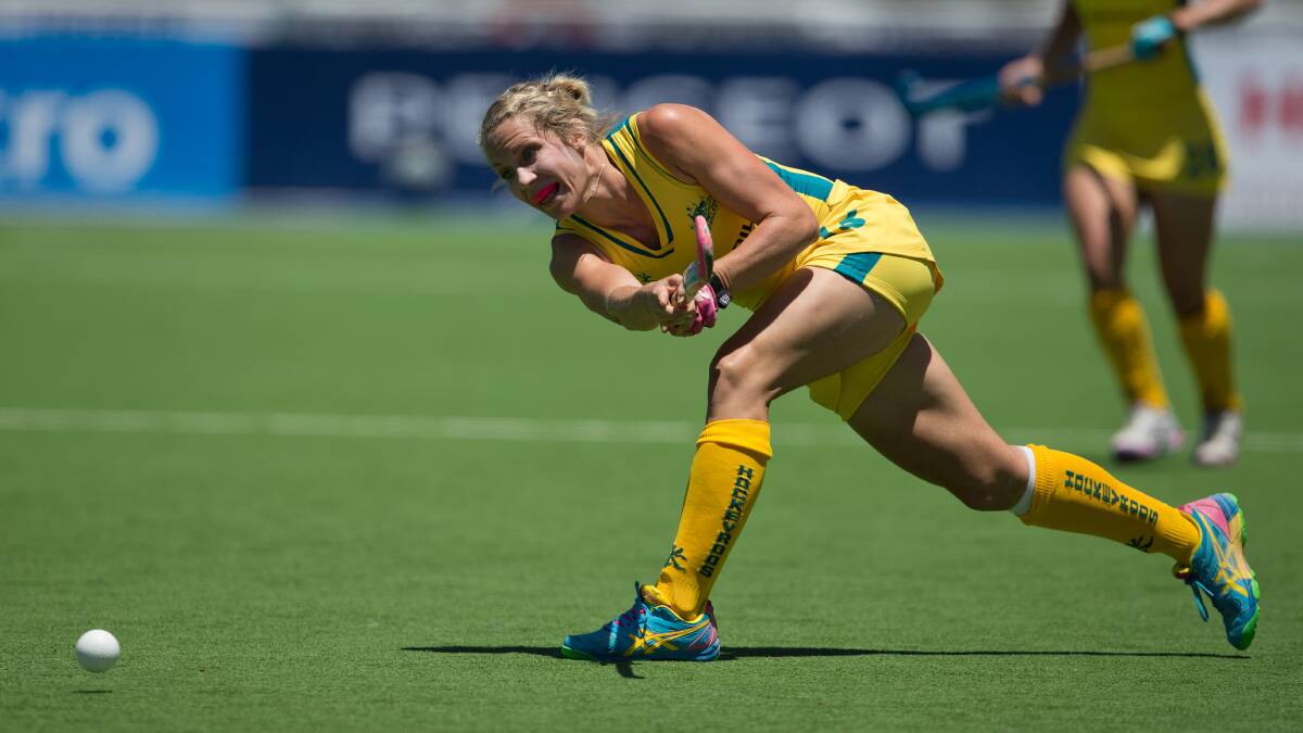 MOVING ON UP: Hockeyroo Edwina Bone passes the ball long in her side's 3-1 win over Germany at the Champions Trophy.  Photo: GRANT TREEBY www.treebyimages.com.au