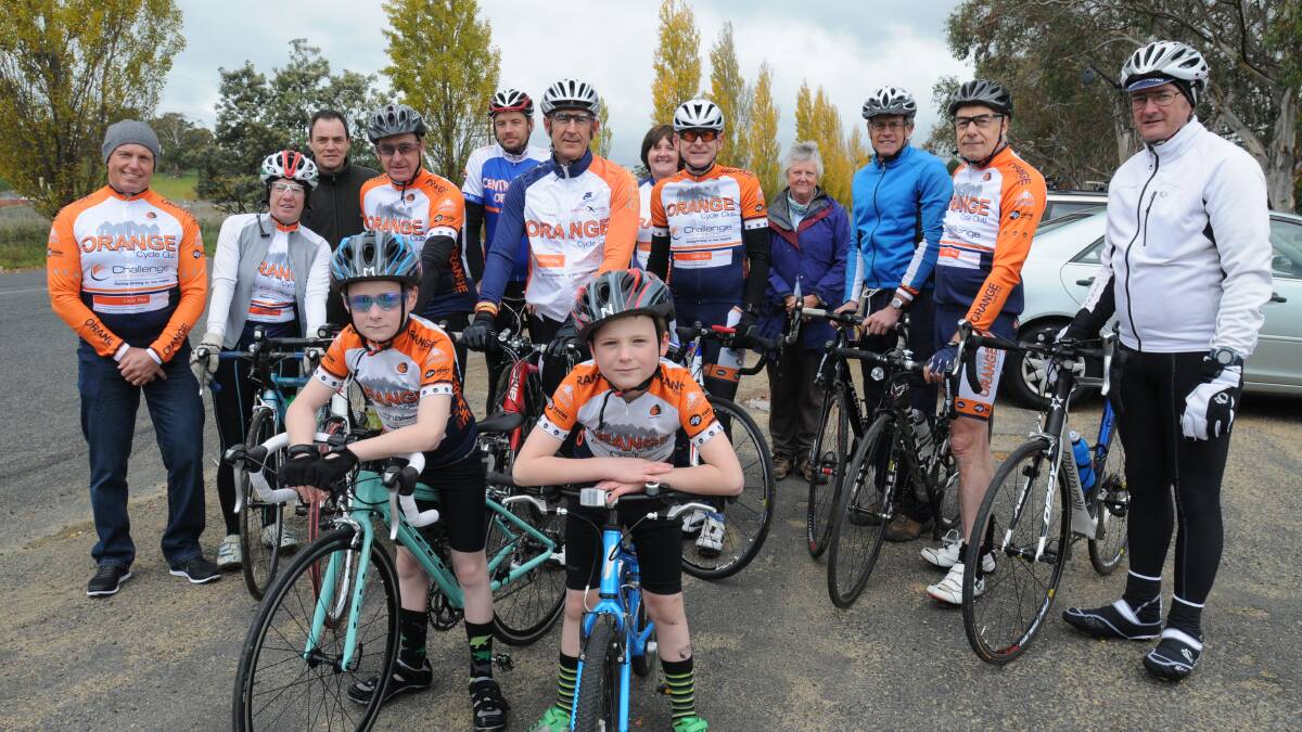 THERE’S ROOM FOR US ALL: Cyclists Aiden Sugden, Gina Brown, Alan Giumelli, Tim Smith, David Cole,  Ray Selmes, Karen Selmes, Colin Dibble, Beryl Turnham, Ian Reed, Ivan Webb and Philip Branwhite  with  Micah Dibble, 10, and Nathan Dibble,8. The group would like to see a better relationship between motorists and cyclists.  Photo: STEVE GOSCH 0504sgbikes1

