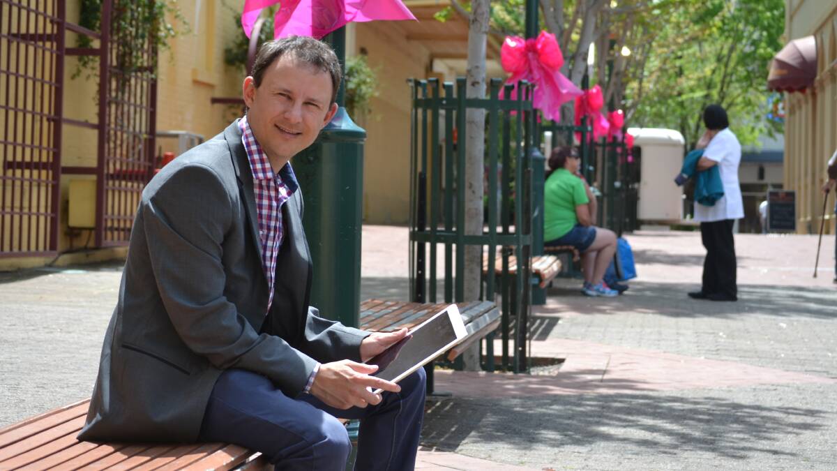 TUNED IN: Gavin Hillier can’t wait to access Wi-Fi in Post Office Lane, but says there needs to be another solution to cope with people who loiter in the laneway and cause problems. Photo: NICOLE KUTER 1024nkwifi