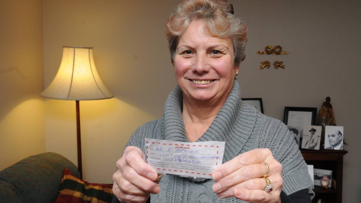 GOLDEN TICKET: Helen Rayner won the Central Western Daily’s Winter Warmer competition. Photo: STEVE GOSCH 0712sgwinner1
