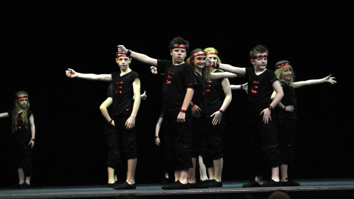 BIG EFFORT: Students from Errowanbang pulled out all the stops in their dance performance at the City of Orange Eisteddfod on Friday. The students travel in to Orange every week for dance lessons to prepare for the eisteddfod. Photo: STEVE GOSCH 0829sgeis4