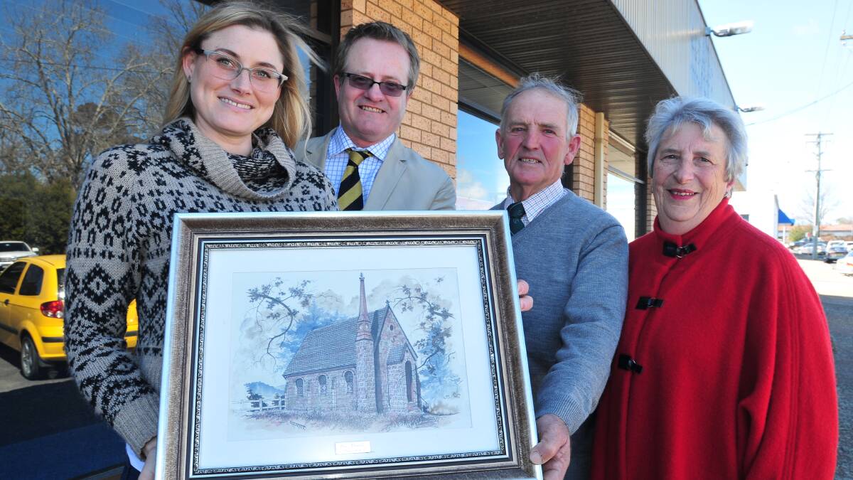 BACK HOME: This painting of the historic Byng Church, by artist Greg Turner, found its way back to Orange and is now in the hands of Dr Simon Hawke and his wife Perri who were married at the church in April. They are with Byng Church caretaker Will Hawke and his wife Barbara. Photo: JUDE KEOGH         0903byngpainting
