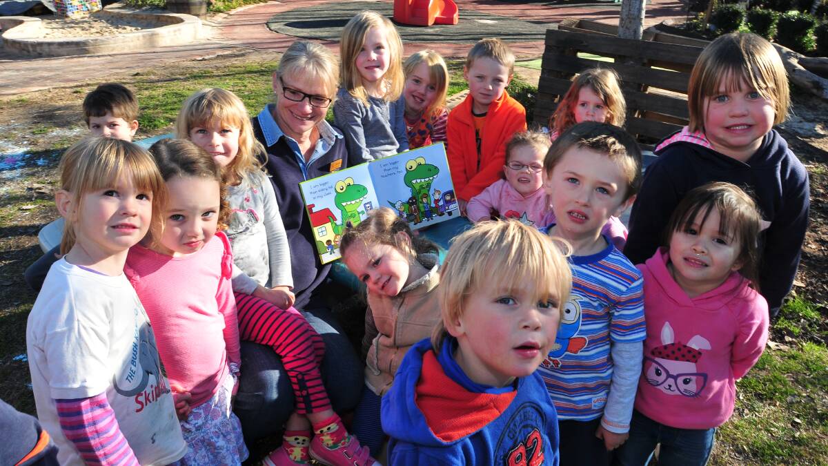 VALUE FOR MONEY: Orange City Council says its targeted services provide value for money for ratepayers. Pictured are Courallie Park Child Development Centre's Katrina Henderson-Matuschka with kids from the Bunyip Room. Photo: JUDE KEOGH 0704childcare2