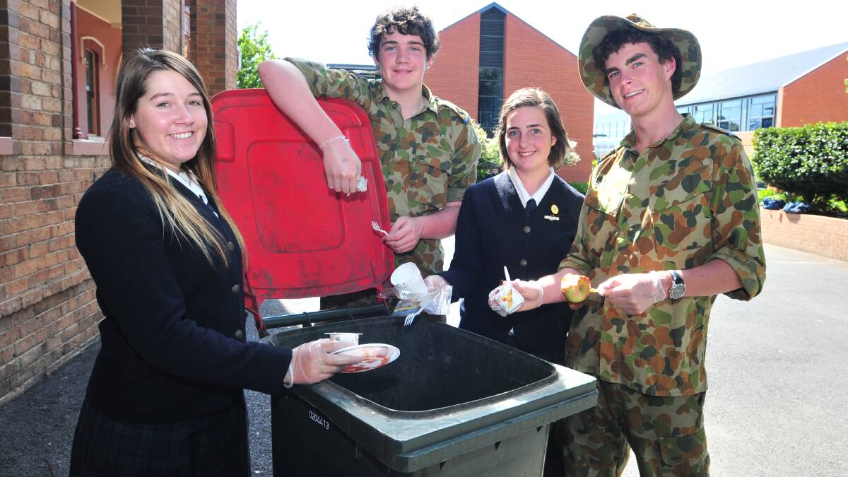 HELPING HANDS: Kinross Wolaroi School's Felicity Weal, Max Peterson, Eleanor Buckley and Robbie Blatch will be among almost 50 students to give the planet a helping hand this Sunday. Photo: JUDE KEOGH 0224cleanup1
