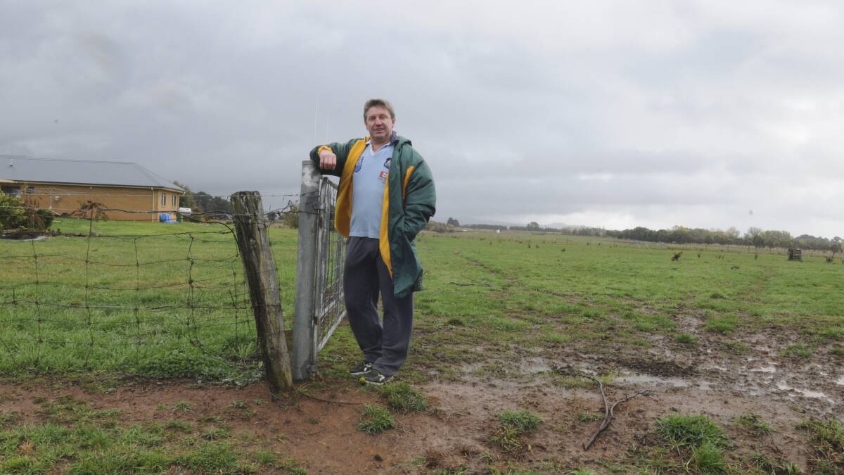 LIVING IN LIMBO: Tony Jones is worried he will lose part or all of his land if the Orange Airport expansion proposal goes ahead.
Photo: JUDE KEOGH 		      0420springhill1