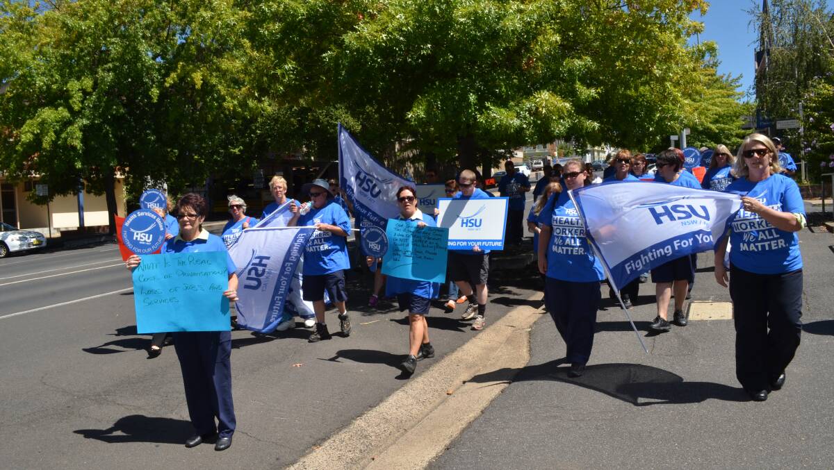 JOBS FIGHT: Health Services Union members protest outside Member for Orange Andrew Gee's office. Photo: DANIELLE CETINSKI 0304dcrally5
