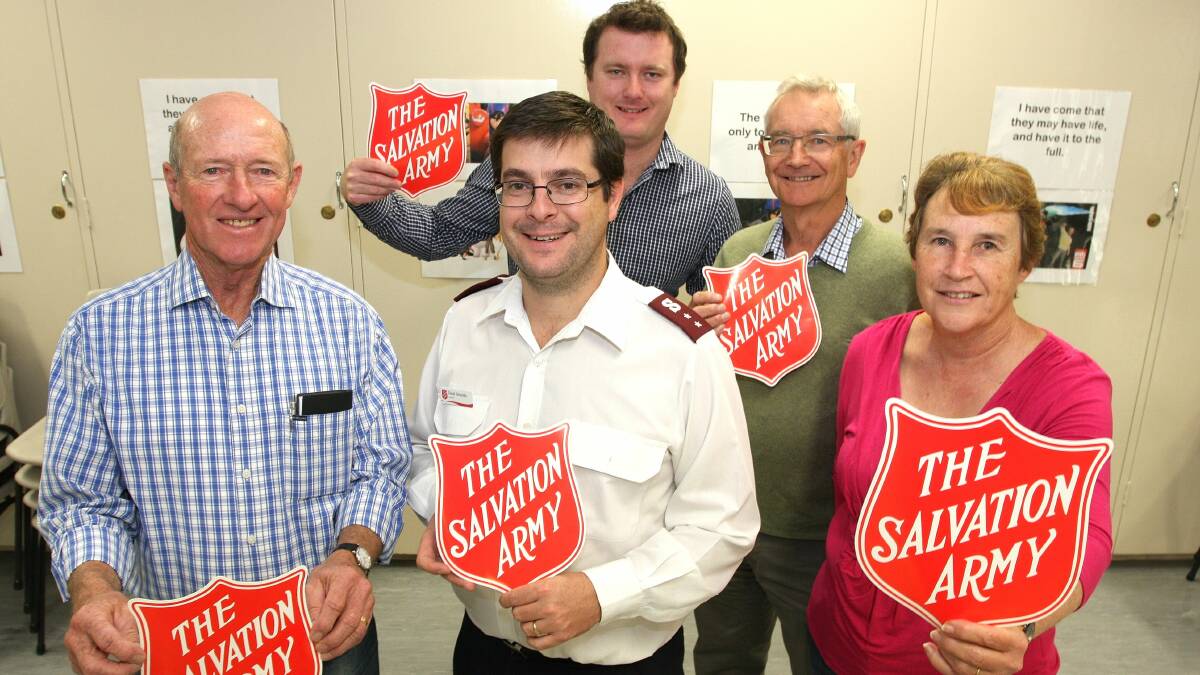 THE GOOD ARMY: (Back) Daniel Casson, David Manning, (front) Geoff Bargwanna, Captain David Grounds and Diane Cooper are preparing for the Red Shield Appeal on May 28-29. Photo: STEVE GOSCH 0428sgsalvos2