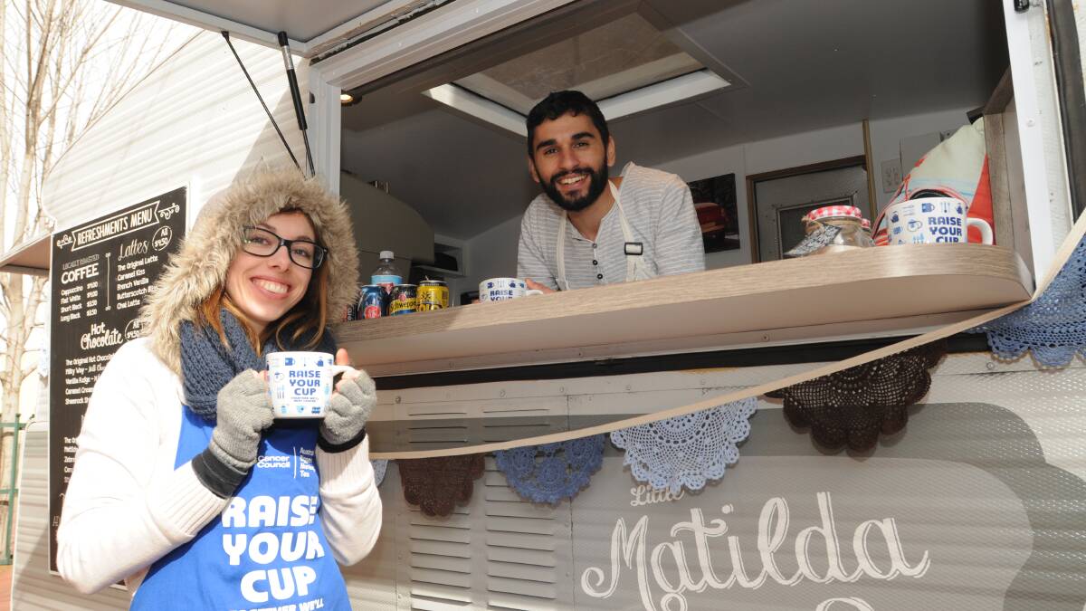 CUPPA FOR A CAUSE: Samara Driscoll and Peter Farag of Little Matilda Lou donated a percentage of profits from the coffee and tea sold to the Cancer Council’s Australia’s Biggest Morning Tea campaign. Photo: STEVE GOSCH                                                                                                                                                              0522sgcuppa1
