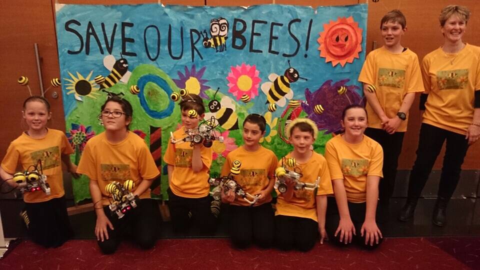 SWEET SUCCESS: The Bee Team from Mullion Creek Public School, Tyarna Pavy, Briana McCluckie, Edward Southwell, James Calleja, Hugh Sheardown, Caitlyn White, Charlie Southwell and teacher Sharon Cloete, won the Robo Cup Primary Dance state competition with a bee-themed robot dance last week. Photo: SUPPLIED 