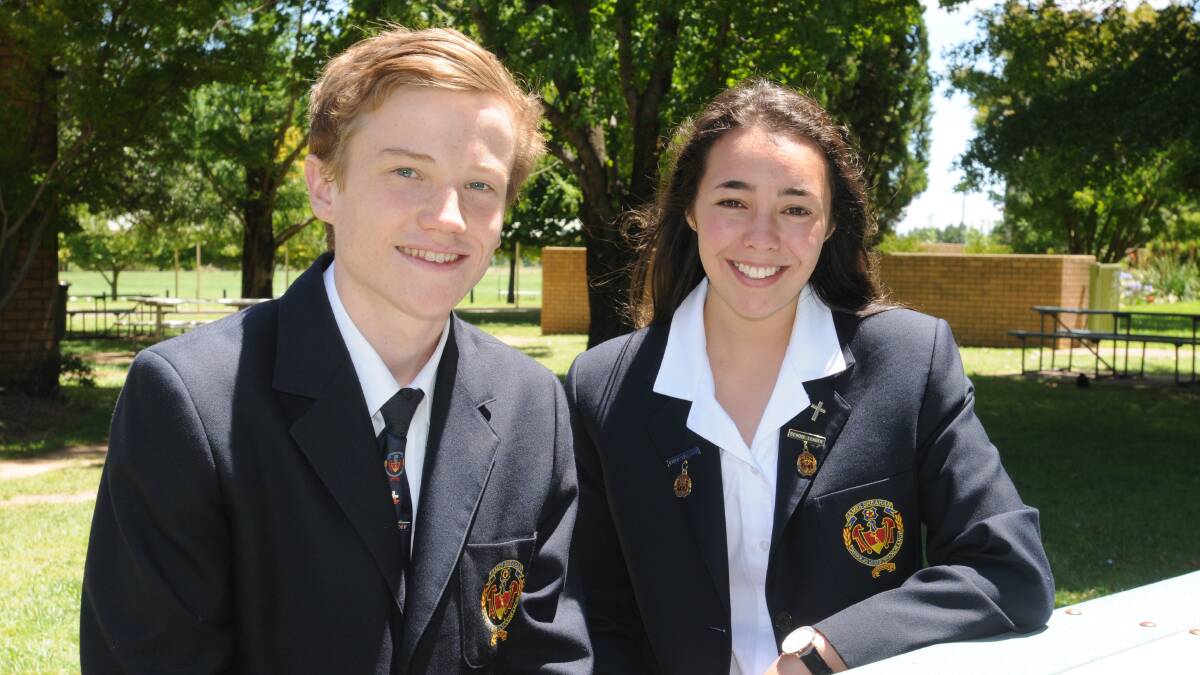 EXCEEDING EXPECTATIONS: Caleb Hewitt and Hannah Khalil from James Sheahan Catholic High School put together a fundraiser to help improve the lives of children in poverty-stricken countries. Photo: JUDE KEOGH                        0205charity1
