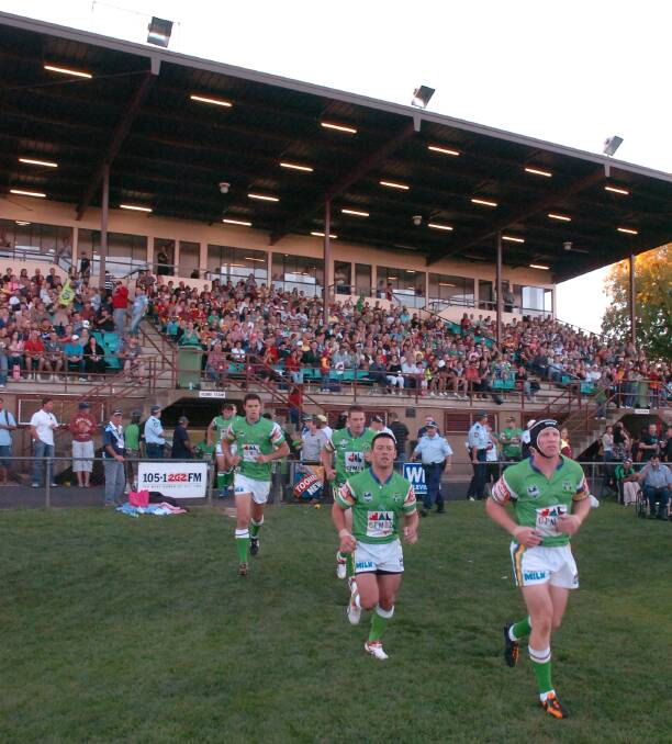 NUMBERS GAME: A big crowd flocked to Wade Park in 2008 to see the Canberra Raiders take on Brisbane and council is hoping similar numbers venture to the Raiders’ clash with Newcastle next month. Photo: JUDE KEOGH 						                    0223nrl8
