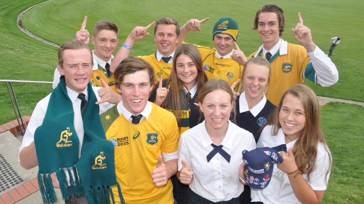 GO BIG DOG: Kinross Wolaroi School students (back, from left) Cameron Rasmussen, Tom Cummins, Hamish Ellis-Peck, Will Freeth, (middle) Nedd Brockmann, Ally Thurn, Lucy Hickmann, (front) Max Manson, Amber Smith and Fenella Jamieson can't wait to watch Ben McCalman in action in the Rugby World Cup final. Photo: NICK McGRATH            1029nmwallabies