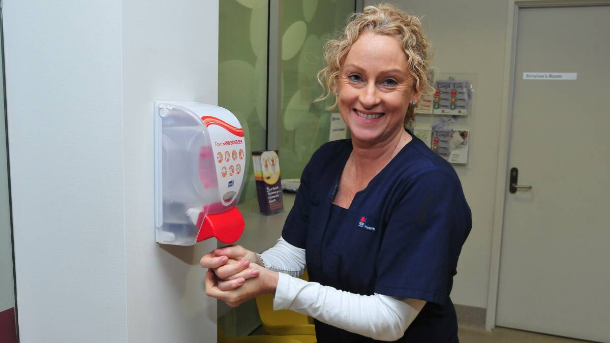 ABOVE THE BENCHMARK: Accident and emergency department nursing unit manager Meg O’Brien says the department has recorded a marked improvement in a campaign to make staff wash their hands before treating patients. Photo: JUDE KEOGH     0715handwash1