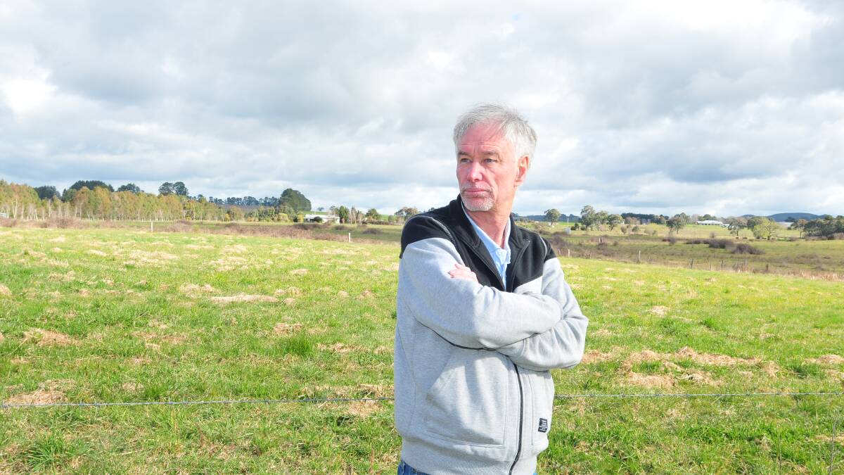 DOG BOXES: Shiralee Road resident Garry Smith says he will be surrounded by small lots when the subdivision is developed. Photo: JUDE KEOGH 0903shiralee4c