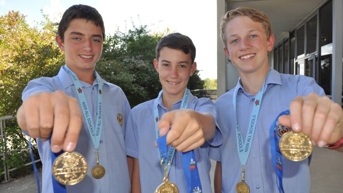 GOLD GOLD GOLD: Sheahan's Jack Parr, Jordan Emerson and Max Stewart won gold in Penrith. Photo: NICK McGRATH 0310nmtri1