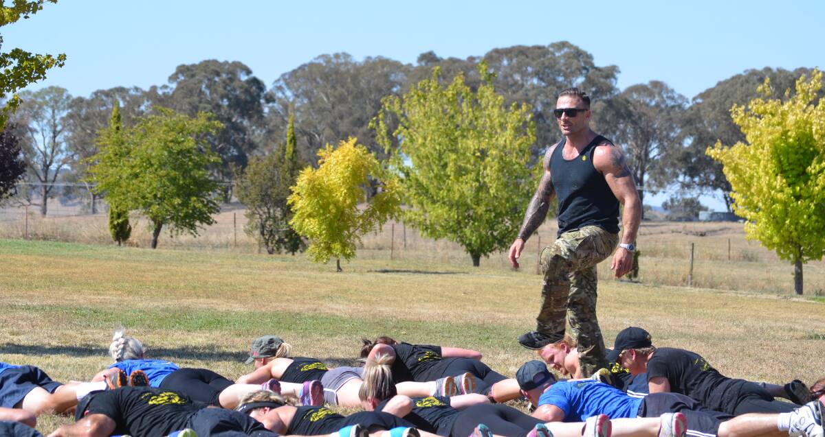 HARD TASK MASTER: The Commando showed no mercy to his afternoon boot camp participants at Integra Health and Fitness on Saturday. Photos: JUDE KEOGH and NICOLE KUTER
