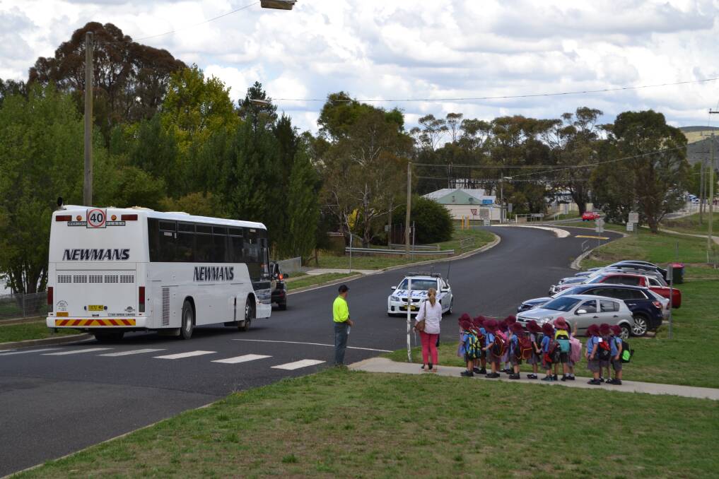 EMERGENCY: Students were evacuated from St Joseph's Catholic School after a chemical spill in a Blayney factory on Thursday. Photos: JUDE KEOGH and BRYANT HEVESI